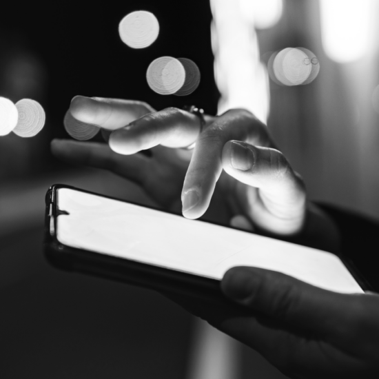 Person quickly scrolling on a smartphone, representing how people move past marketing content that does not immediately grab attention online.
